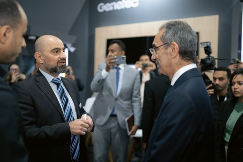 Cairo ICT - minister stand conversation